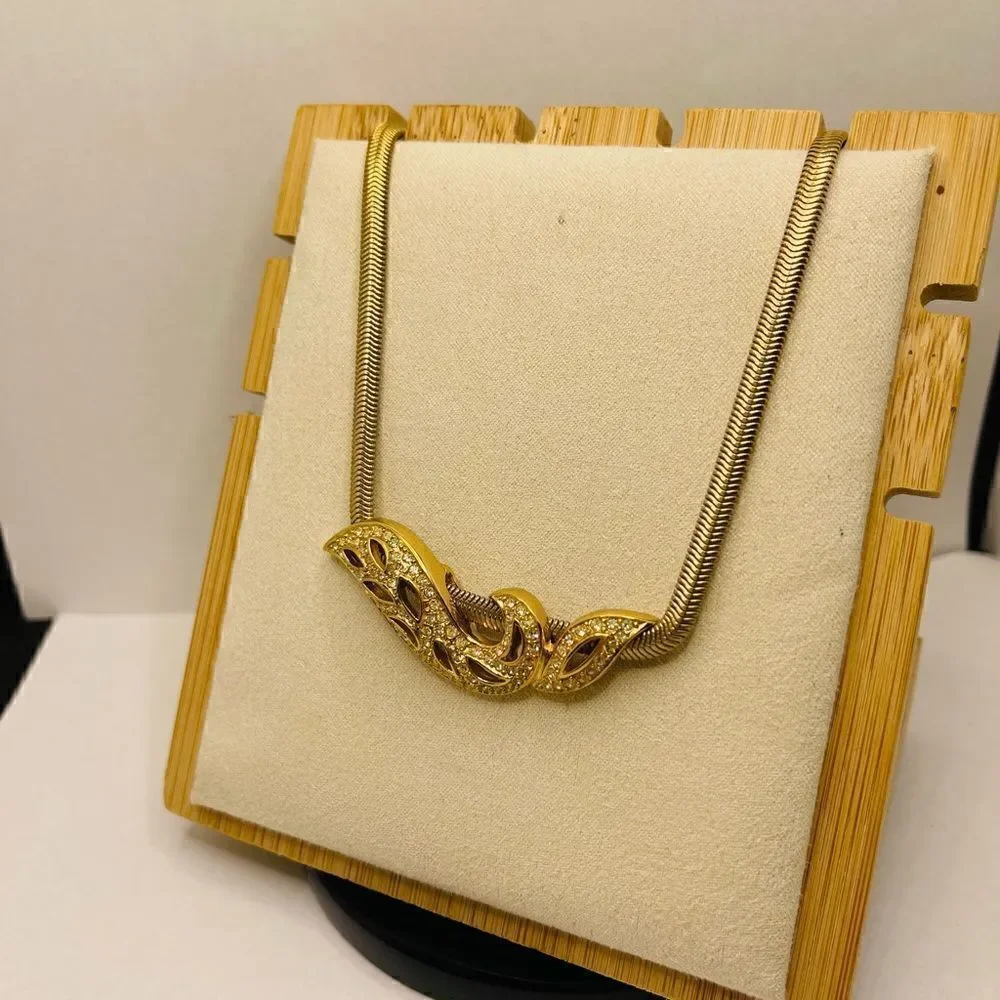 Real Christian Dior gold tone necklace rhinestone pendant